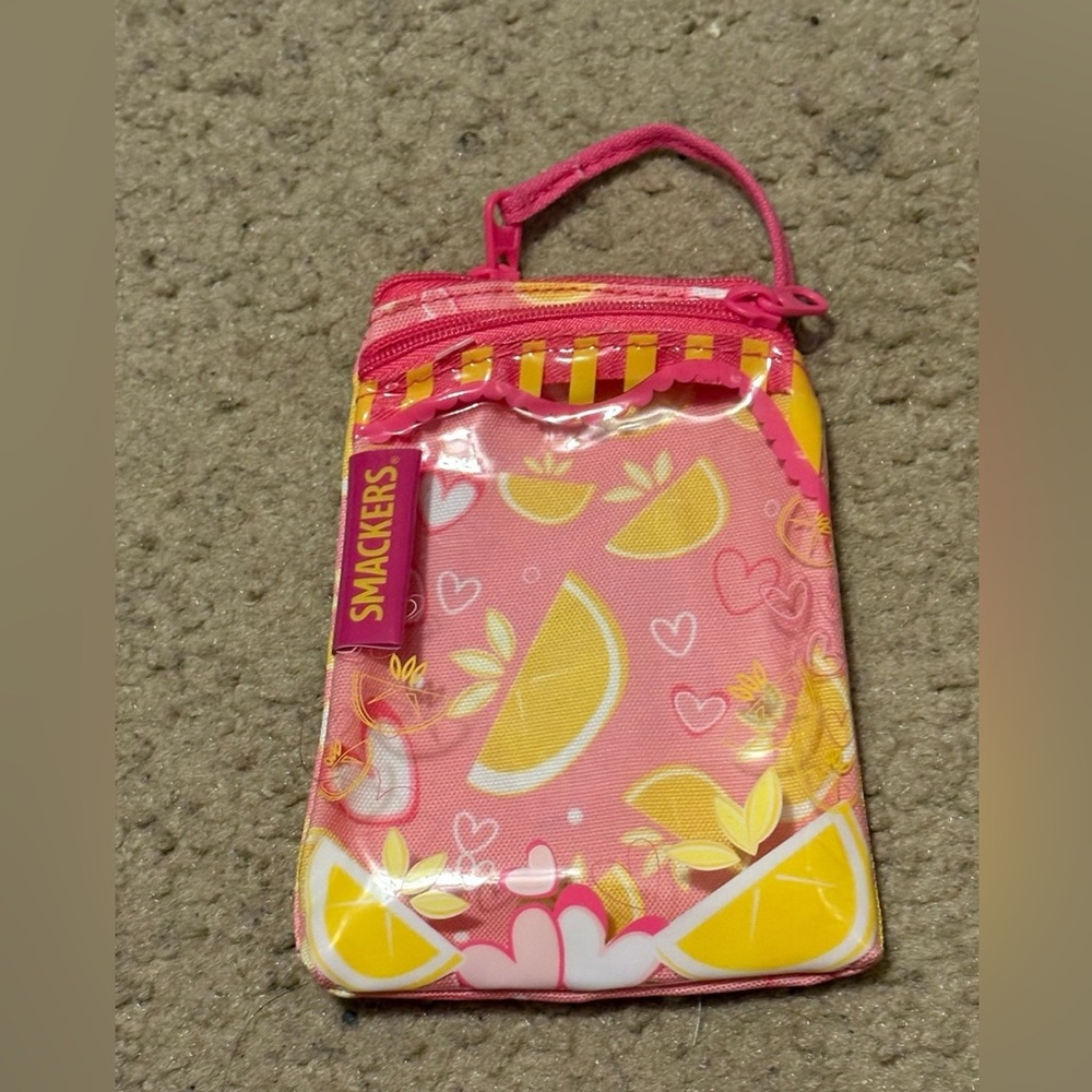 NWOT Lip Smackers brand lemon/summery themed pouch 
- has 2 zipper compartments